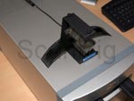 Appareil de nettoyage de film mécanique KineStat KS-070 sur le scanner Nikon de format moyen