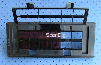 The strip film holder FH-835S for 35mm film strips with opened frame for up to 12 images