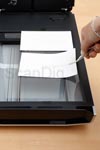 Safe insertion and removal of paper pictures during the scanning